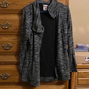 Avalanche side zip and button jacket.